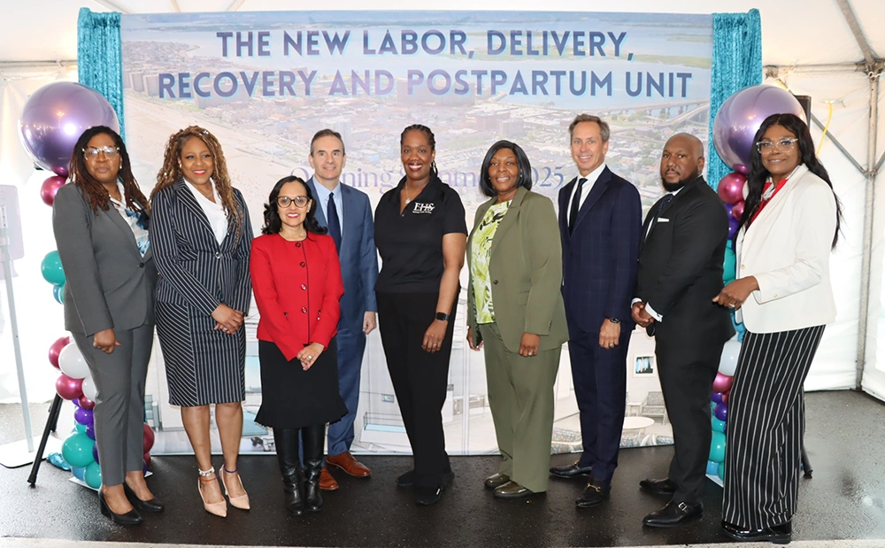 Donald T. Morrish, MD. MMM, (third from right), Chief Executive Officer of EHS is pictured with Jacqueline Marecheau, MD, FACOG, (center) Chair of OBGYN, and EHS leaders (from left): Keisha-Ann Wisdom, DHA, MBA, BSN, RN, NEA-BC, SVP of Patient Services & Chief Nursing Officer; Jameela Yusuff, MD, MPH, SVP & Chief Medical Officer; Steven Guido, EVP & Chief Financial Officer; Sharika Gordon, SVP & Chief People Officer; John Lott, Vice President of Compliance, Privacy & Security; and Sharon Kennedy, Associate Chief Nursing Officer. Lisa George (second from left), a representative from the office of NYS Senator James Sanders, Jr.’s is also pictured.
