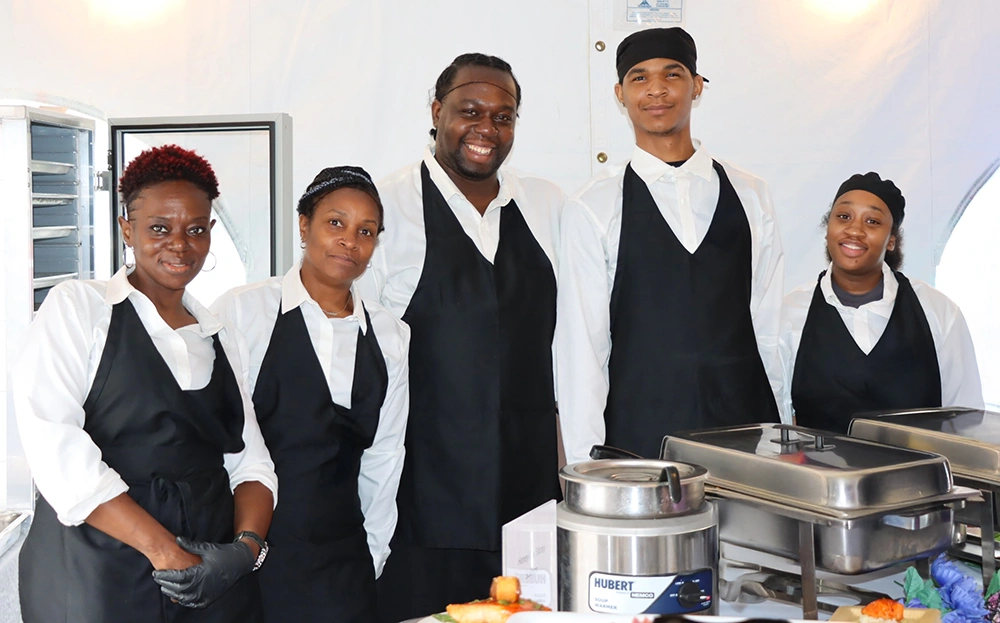 Members of EHS’ Dietary Team (from left): Allana Ellis, Charlene Cartagena, Charwin Reid, Jaden Cordero, and Aliyah Williams provided a delicious assortment of food, offering a sneak peek of the culinary delights that will be available to expectant mothers when EHS’ new LDRP suite opens.