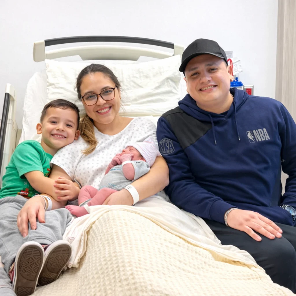 Proud parents Maryelyn Mendoza Sandoval and Joseph Sanchez are pictured with their son, Jonas and his big brother, Ilam.