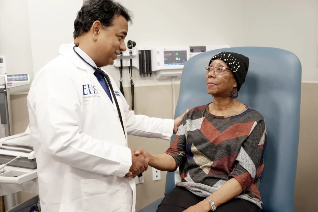 Dr. Khurana discusses heart health with a patient