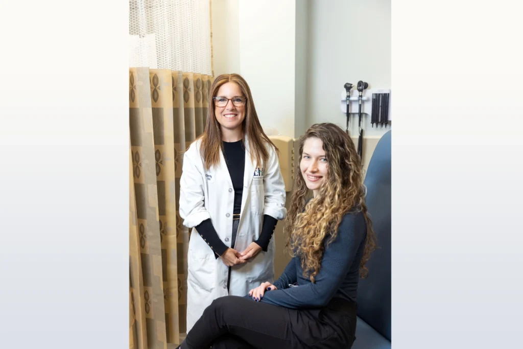 Dr. Rachel Gordon and patient in exam room
